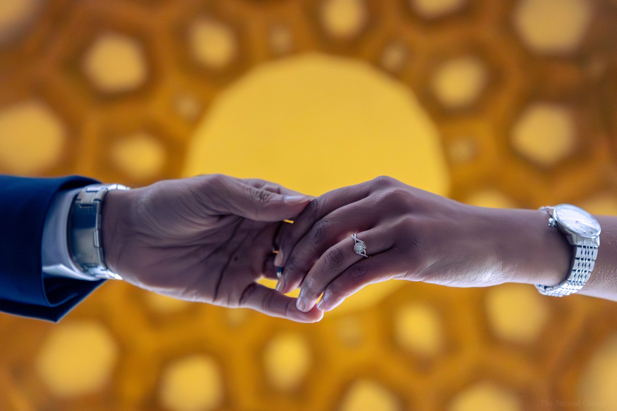 Hands with engagement ring