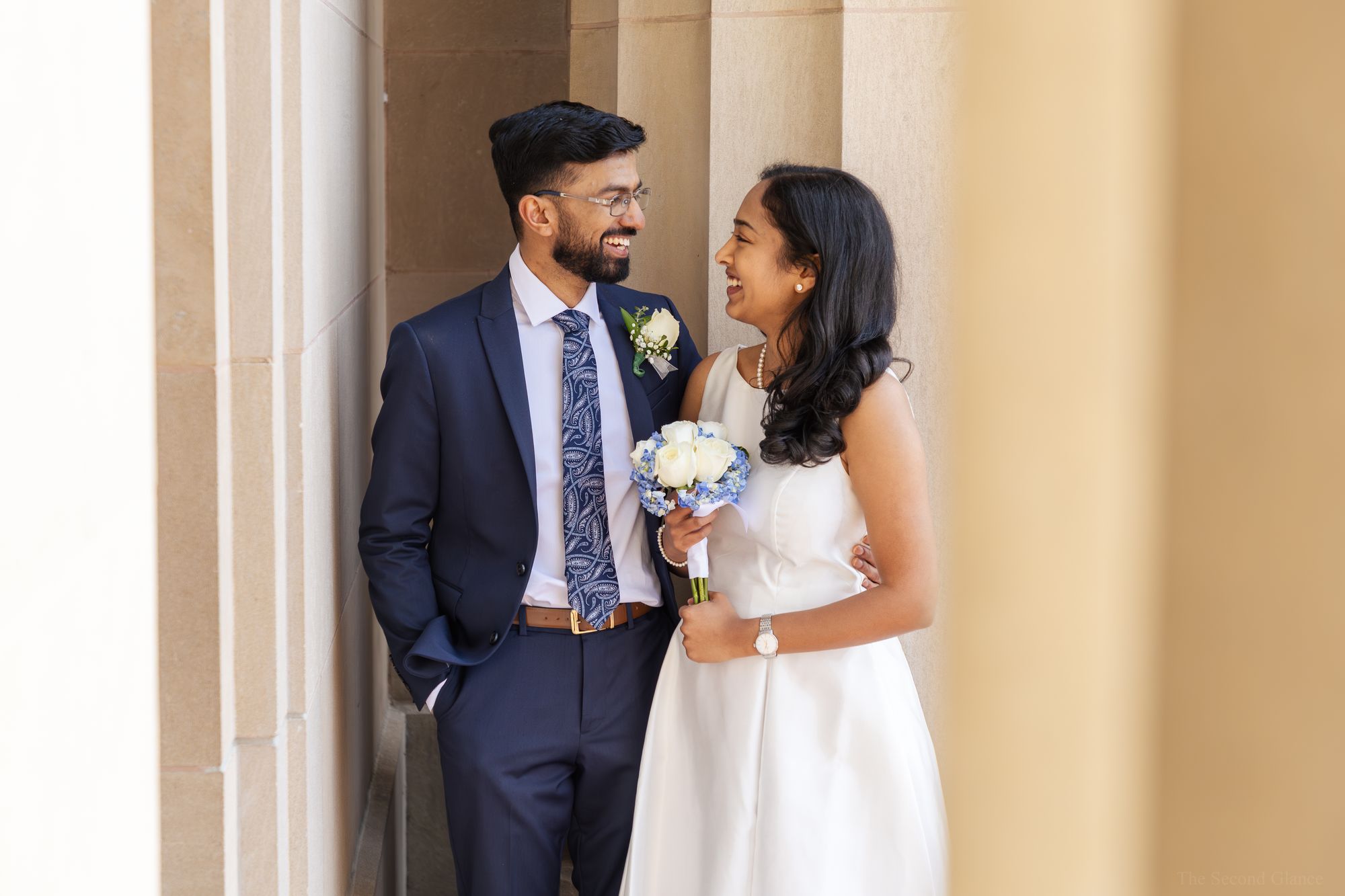 Wedding couple laughing